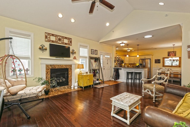 95 S Ridge Ln Unit A203, Berlin, CT 06037 - living room with lofted ceiling, ceiling fan, a fireplace, dark wood-style flooring, and recessed lighting