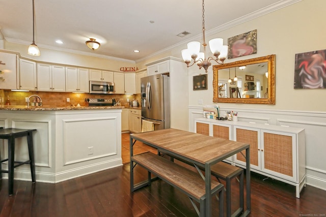 95 S Ridge Ln Unit A203, Berlin, CT 06037 - dining space with ornamental molding, a chandelier, dark wood-style floors, a decorative wall, and recessed lighting