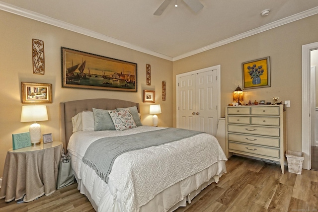 95 S Ridge Ln Unit A203, Berlin, CT 06037 - bedroom featuring wood finished floors, ornamental molding, a closet, and ceiling fan