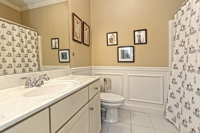 95 S Ridge Ln Unit A203, Berlin, CT 06037 - full bath with ornamental molding, toilet, vanity, a wainscoted wall, and tile patterned flooring