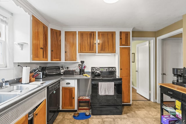 116 Maple St, Wethersfield, CT 06109 - kitchen with black appliances, brown cabinets, and a sink