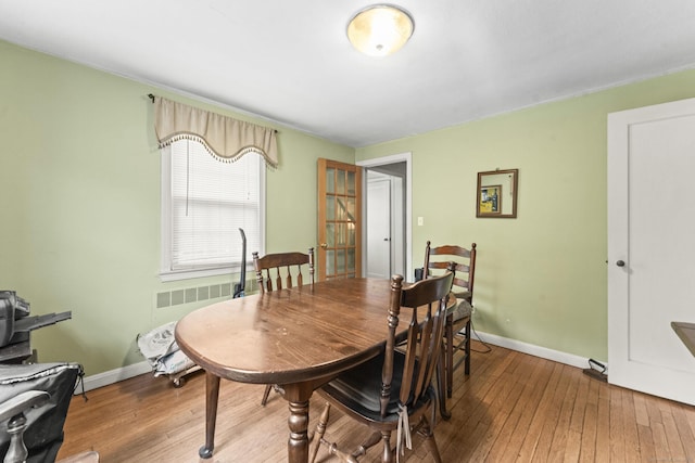 116 Maple St, Wethersfield, CT 06109 - dining room featuring wood-type flooring and baseboards