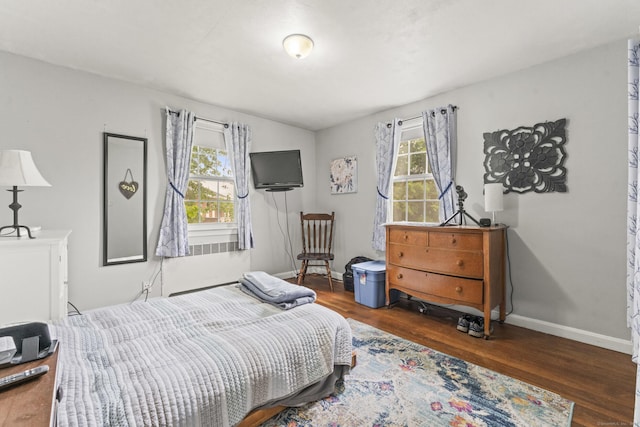 116 Maple St, Wethersfield, CT 06109 - bedroom with multiple windows, wood finished floors, and baseboards