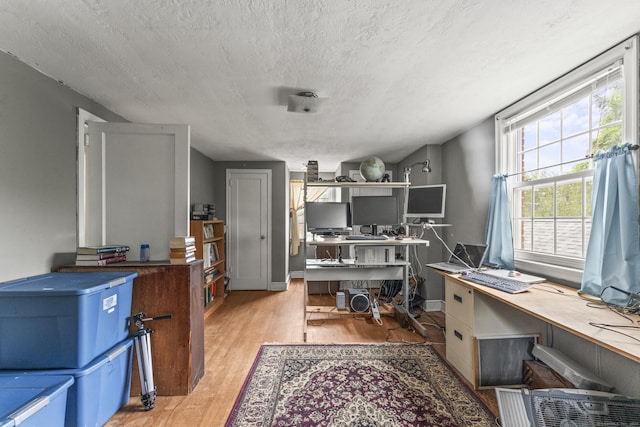 116 Maple St, Wethersfield, CT 06109 - home office featuring wood finished floors and a textured ceiling