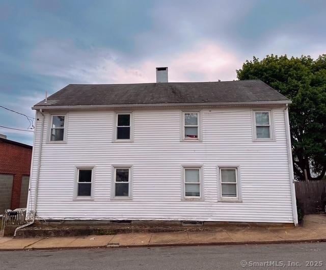 8 3rd St, Norwich, CT 06360 - view of property exterior with a chimney