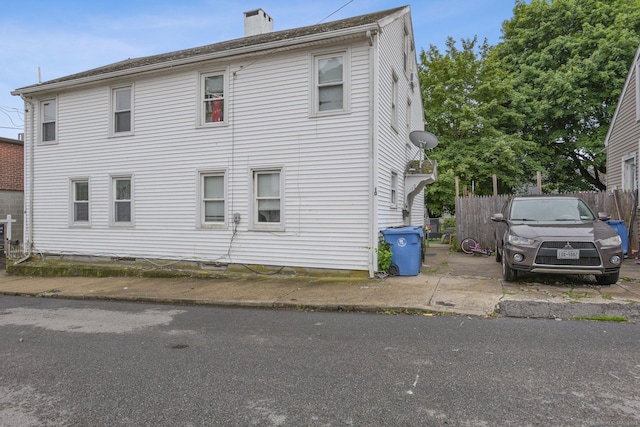 8 3rd St, Norwich, CT 06360 - view of side of home featuring a chimney