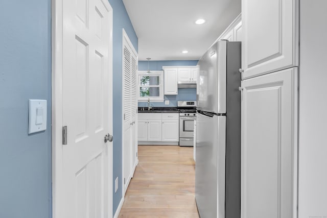 77 Shea Ave Unit 77, Milford, CT 06460 - corridor with a sink, light wood finished floors, and recessed lighting