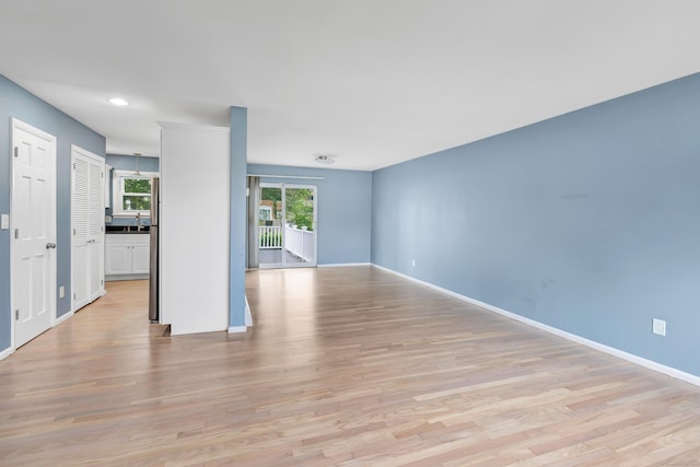 77 Shea Ave Unit 77, Milford, CT 06460 - unfurnished room featuring light wood-style flooring, baseboards, and recessed lighting