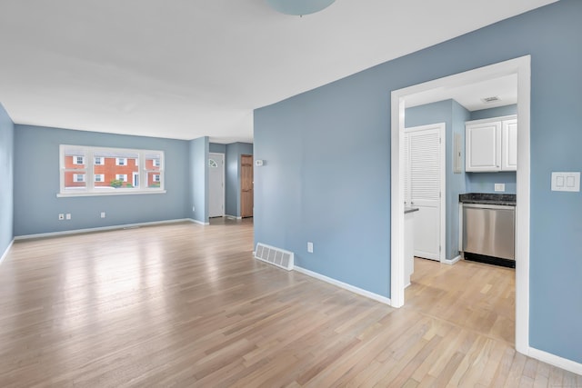 77 Shea Ave Unit 77, Milford, CT 06460 - empty room with light wood finished floors and baseboards