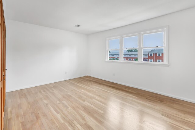 77 Shea Ave Unit 77, Milford, CT 06460 - unfurnished room featuring light wood finished floors and baseboards