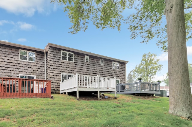 77 Shea Ave Unit 77, Milford, CT 06460 - back of property featuring a deck and a lawn