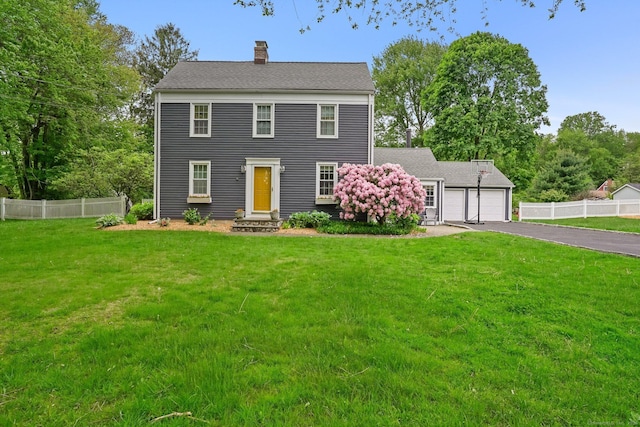 17 Chester Rd, Easton, CT 06612 - colonial home with a chimney, asphalt driveway, entry steps, and a garage
