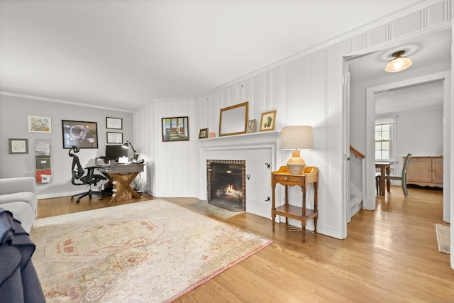 17 Chester Rd, Easton, CT 06612 - living room featuring an office area, wood finished floors, a fireplace, and ornamental molding