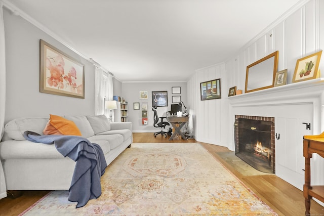 17 Chester Rd, Easton, CT 06612 - living area featuring wood finished floors, a brick fireplace, and ornamental molding