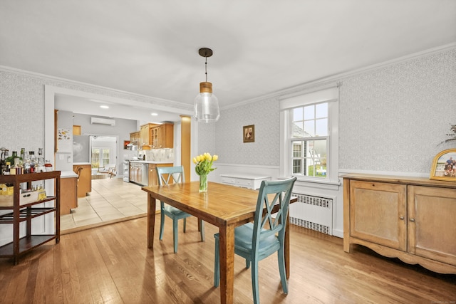 17 Chester Rd, Easton, CT 06612 - dining room with radiator heating unit, ornamental molding, plenty of natural light, light wood-style flooring, and a wall unit AC