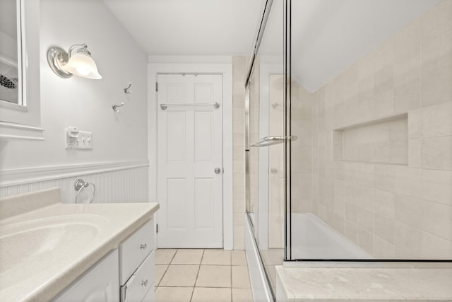 17 Chester Rd, Easton, CT 06612 - bathroom with tub / shower combination, tile patterned floors, vanity, and wainscoting