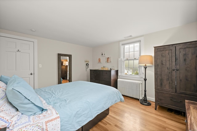 17 Chester Rd, Easton, CT 06612 - bedroom featuring radiator heating unit, light wood-type flooring, and baseboards
