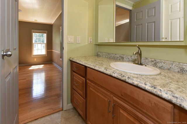 107 Colchester Commons, Colchester, CT 06415 - bathroom featuring vanity and wood finished floors