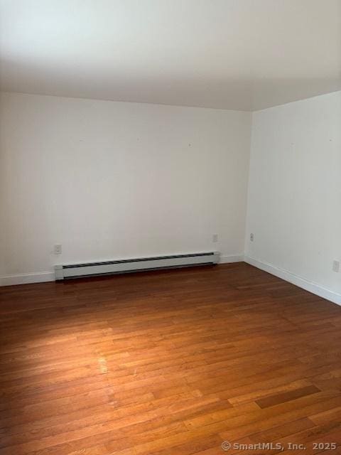 61 Clinton Ave Unit 2, Stamford, CT 06901 - spare room with a baseboard radiator, light wood-style flooring, and baseboards