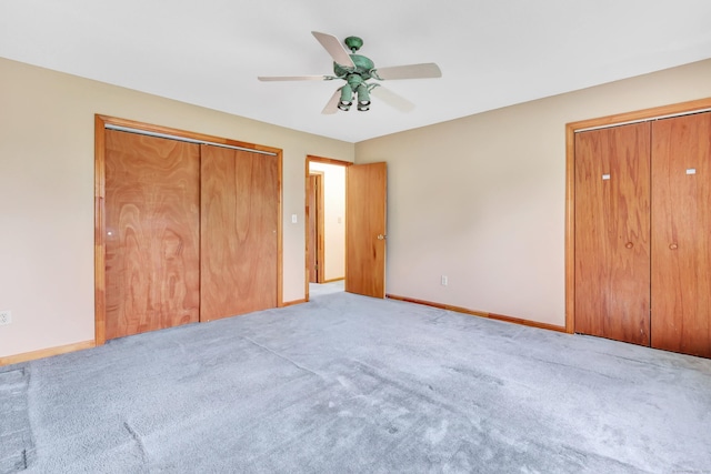 9 Cypress Ln, Trumbull, CT 06611 - unfurnished bedroom with carpet floors, multiple closets, and baseboards