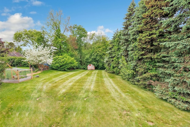 9 Cypress Ln, Trumbull, CT 06611 - view of grassy yard featuring a garden