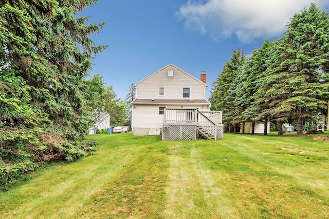 9 Cypress Ln, Trumbull, CT 06611 - back of property with a lawn, a wooden deck, a chimney, and stairs