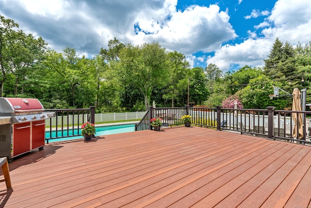 19 Huckleberry Dr S, Norwalk, CT 06850 - wooden terrace featuring area for grilling and view of scattered trees