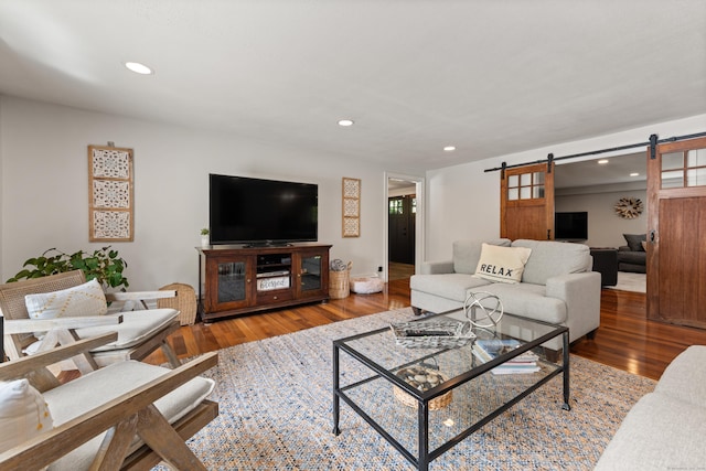 19 Huckleberry Dr S, Norwalk, CT 06850 - living room with a barn door, wood finished floors, and recessed lighting