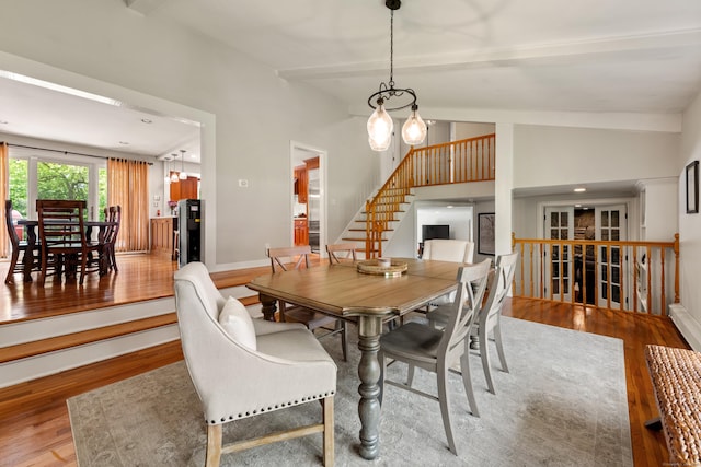 19 Huckleberry Dr S, Norwalk, CT 06850 - dining space with light wood-style floors, stairway, a chandelier, and baseboards