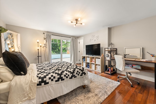 19 Huckleberry Dr S, Norwalk, CT 06850 - bedroom with access to exterior, dark wood-style floors, and a desk