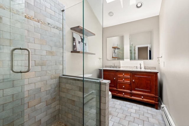 19 Huckleberry Dr S, Norwalk, CT 06850 - bathroom with a stall shower, a baseboard heating unit, double vanity, toilet, and tile patterned floors