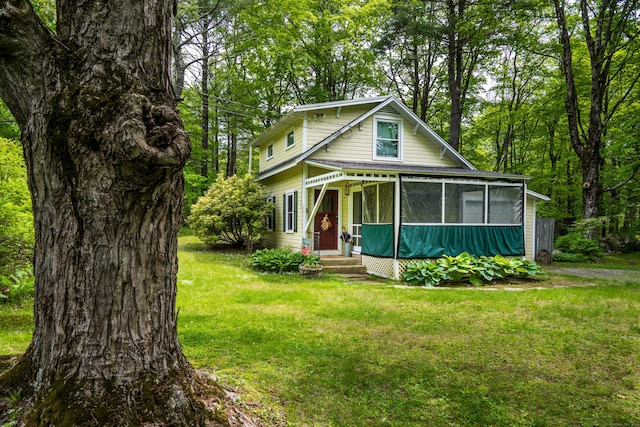 81 Milton Rd, Goshen, CT 06756 - view of front facade with a sunroom and a front yard