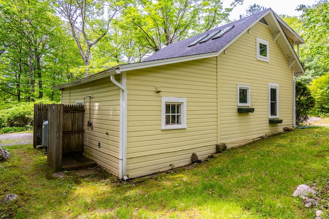 81 Milton Rd, Goshen, CT 06756 - view of side of home featuring a shingled roof and a lawn