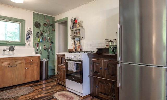 81 Milton Rd, Goshen, CT 06756 - bathroom featuring crown molding, wood finished floors, decorative backsplash, and vanity