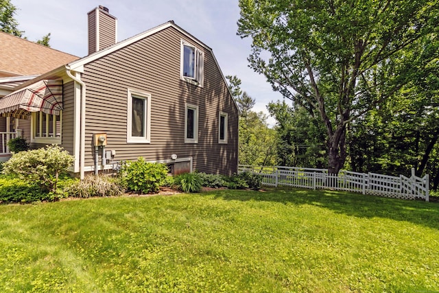 131 Spring Brook Dr, Middletown, CT 06457 - view of side of home featuring a chimney