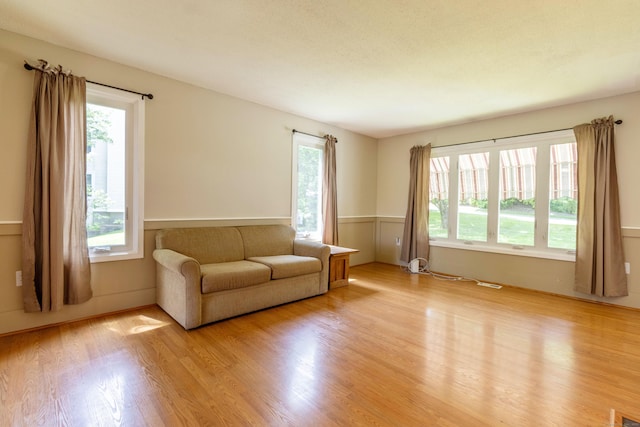 131 Spring Brook Dr, Middletown, CT 06457 - living room with plenty of natural light and light wood-style flooring