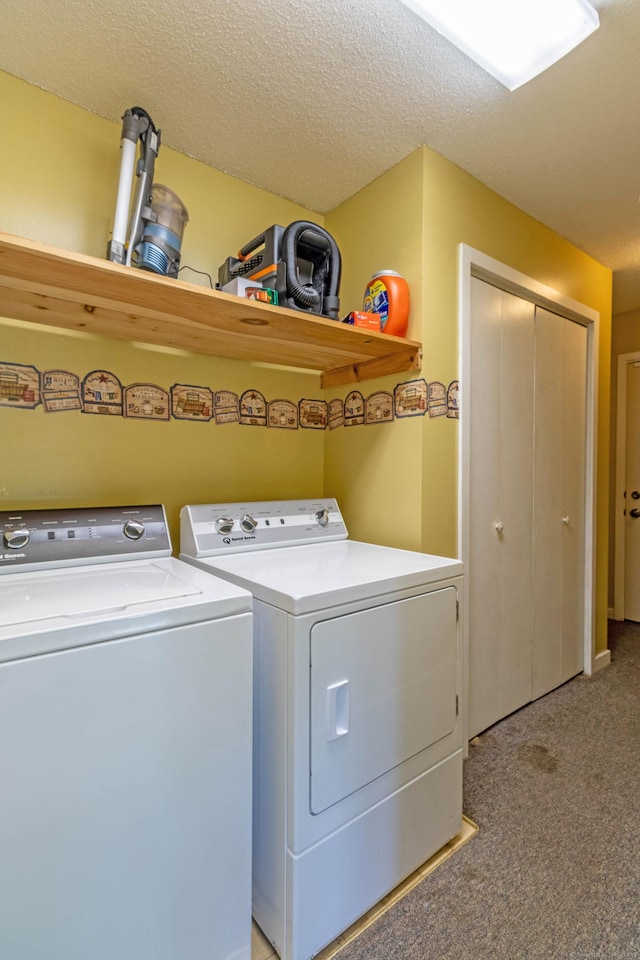 131 Spring Brook Dr, Middletown, CT 06457 - laundry area featuring washing machine and dryer, carpet floors, and a textured ceiling