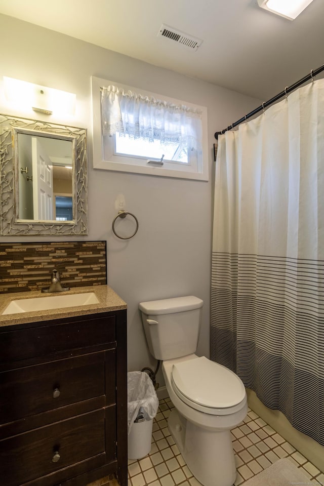 131 Spring Brook Dr, Middletown, CT 06457 - bathroom featuring toilet, vanity, and a shower with shower curtain