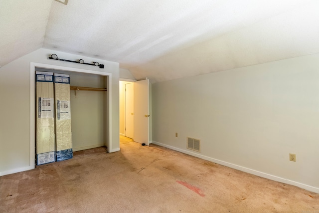 131 Spring Brook Dr, Middletown, CT 06457 - additional living space featuring lofted ceiling, carpet, and baseboards