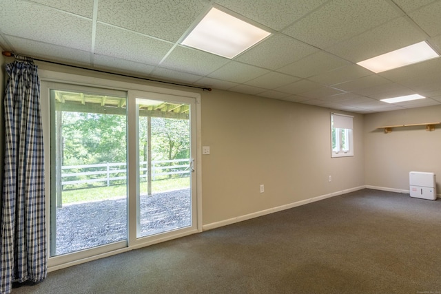 131 Spring Brook Dr, Middletown, CT 06457 - spare room with dark carpet, baseboards, and a drop ceiling