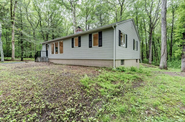 33 White Oak Ln, Woodbridge, CT 06525 - view of property exterior with a chimney