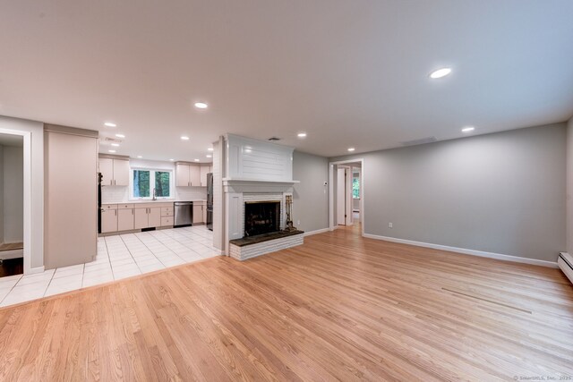 33 White Oak Ln, Woodbridge, CT 06525 - unfurnished living room featuring light wood-style flooring, recessed lighting, a fireplace, and baseboards