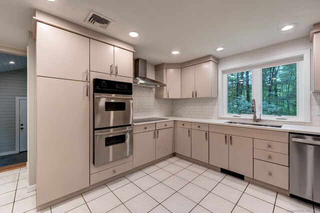33 White Oak Ln, Woodbridge, CT 06525 - kitchen featuring wall chimney range hood, appliances with stainless steel finishes, a sink, light countertops, and recessed lighting