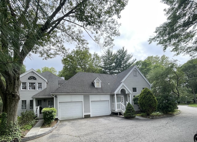 1433 Naugatuck Ave Unit 1433, Milford, CT 06461 - traditional-style home with a garage, driveway, and roof with shingles