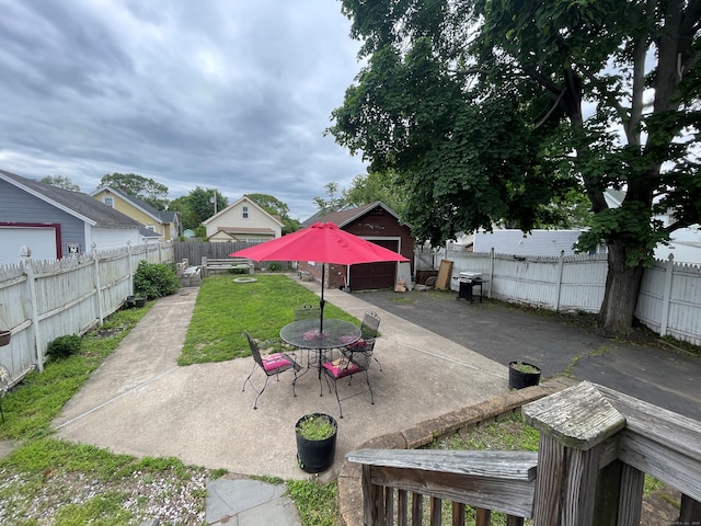19 Marion St, West Haven, CT 06516 - fenced backyard with a patio and outdoor dining space