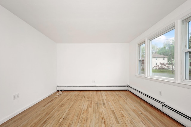 166 Wynola Ave, New Britain, CT 06051 - bonus room with a baseboard radiator, hardwood / wood-style flooring, and baseboards