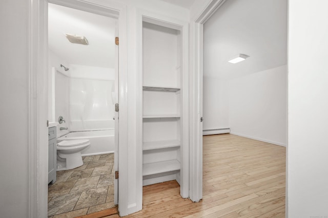 166 Wynola Ave, New Britain, CT 06051 - closet featuring a baseboard heating unit