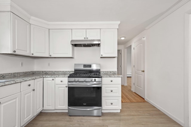 166 Wynola Ave, New Britain, CT 06051 - kitchen featuring stainless steel range with gas cooktop, under cabinet range hood, light wood-style floors, and white cabinetry