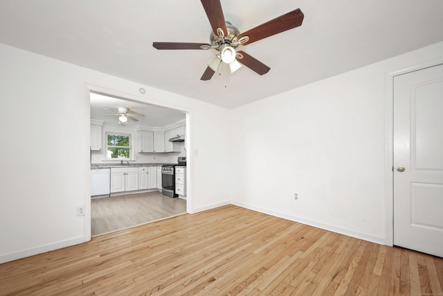 166 Wynola Ave, New Britain, CT 06051 - unfurnished living room featuring light wood-style floors, ceiling fan, baseboards, and a sink