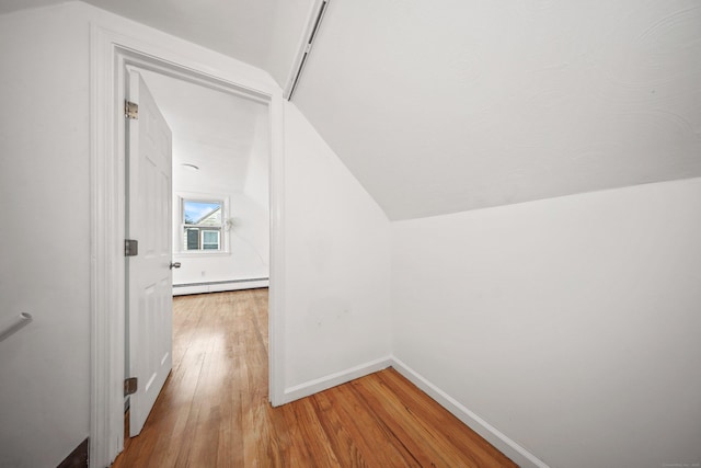 166 Wynola Ave, New Britain, CT 06051 - hall with light wood-style floors, a baseboard heating unit, vaulted ceiling, and baseboards